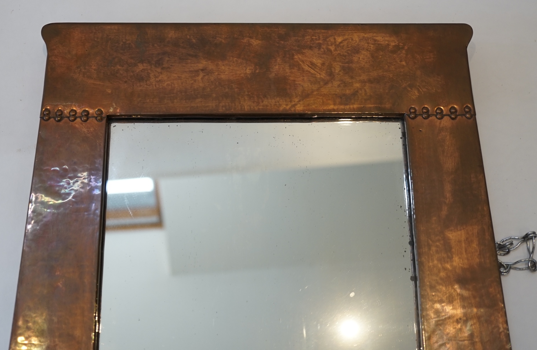 A Liberty Arts & Crafts copper wall mirror